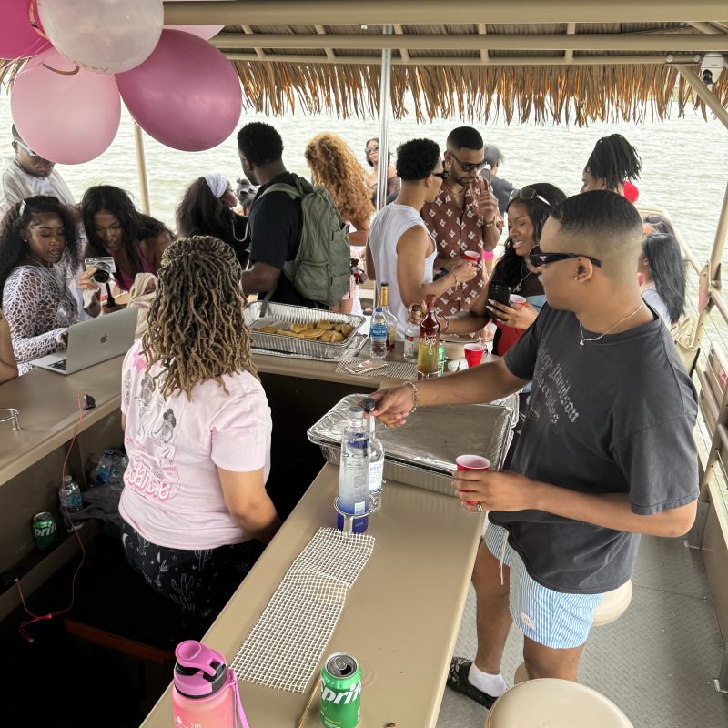 a group of people sitting at a table