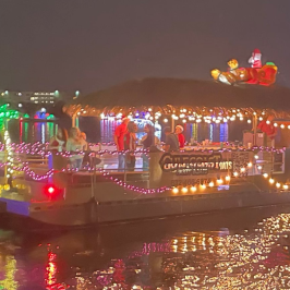 a boat that is lit up at night